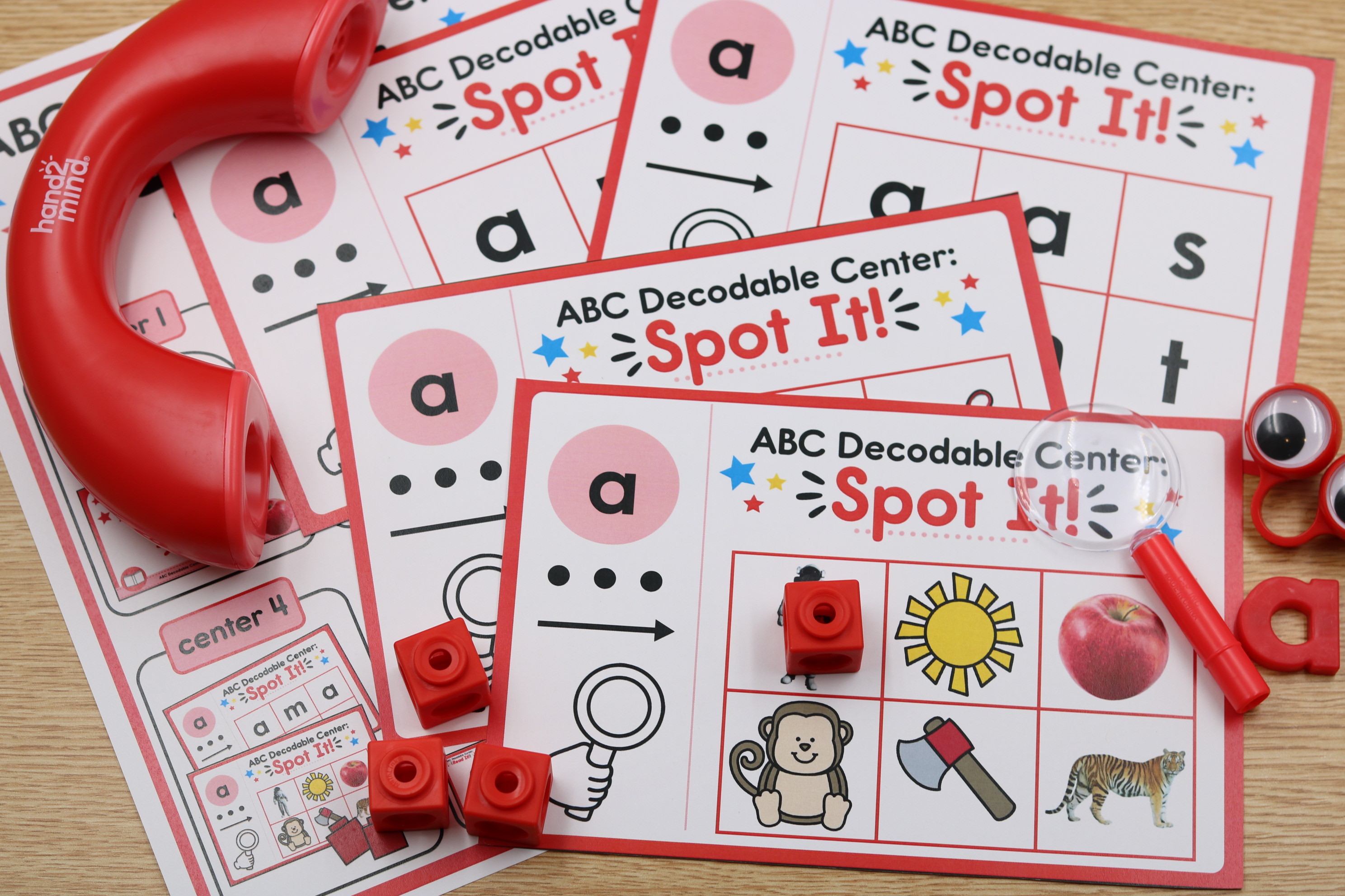 ABC decodable phonics Spot It center featuring letter A sound practice with picture identification, letter recognition, and hands-on manipulatives.