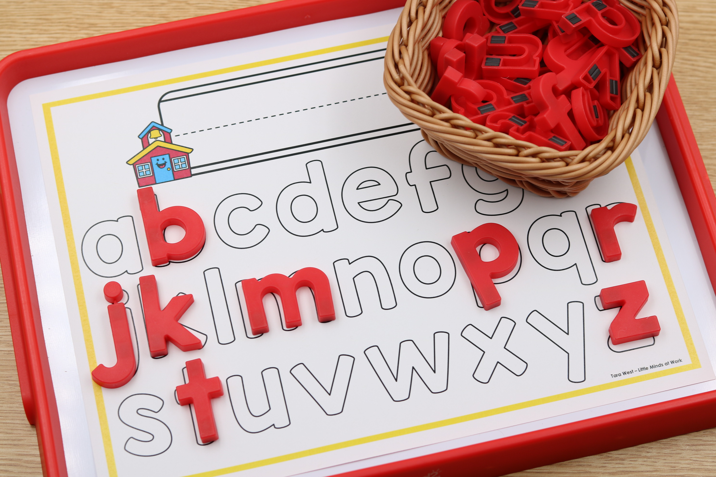 back to school alphabet mats using the hand2mind magnetic tray as students place the magnets onto the mat