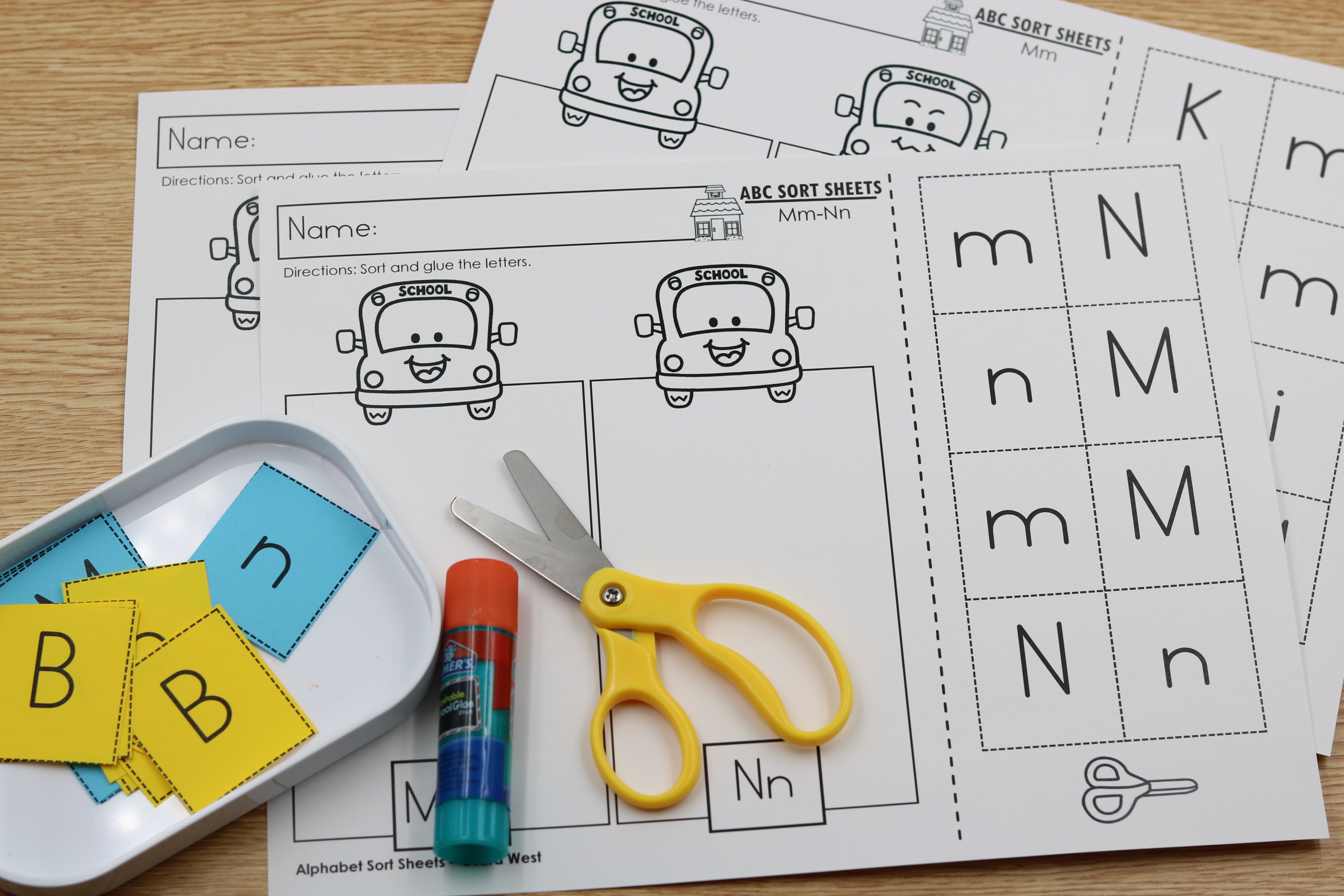 free kindergarten back to school letter sorting printables as they sort letters Mm and Nn