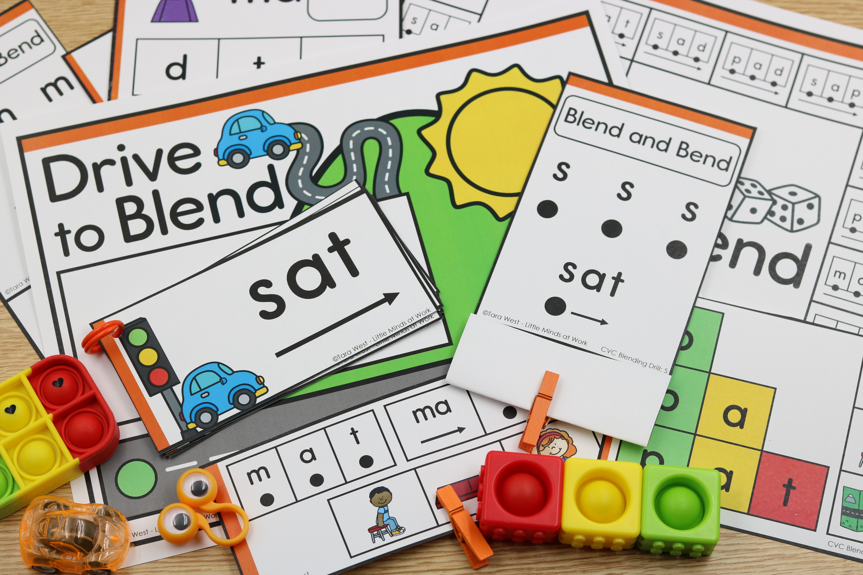 kindergarten cvc blending centers as students clip, roll, and explore cvc words for phonics