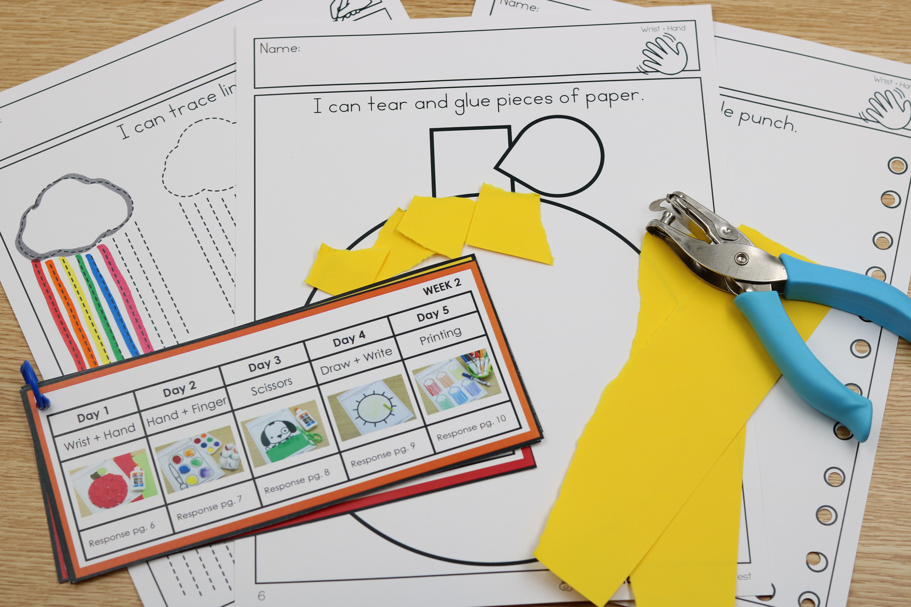 Teacher assortment of fine motor lessons on a card and fine motor printables for kindergarten