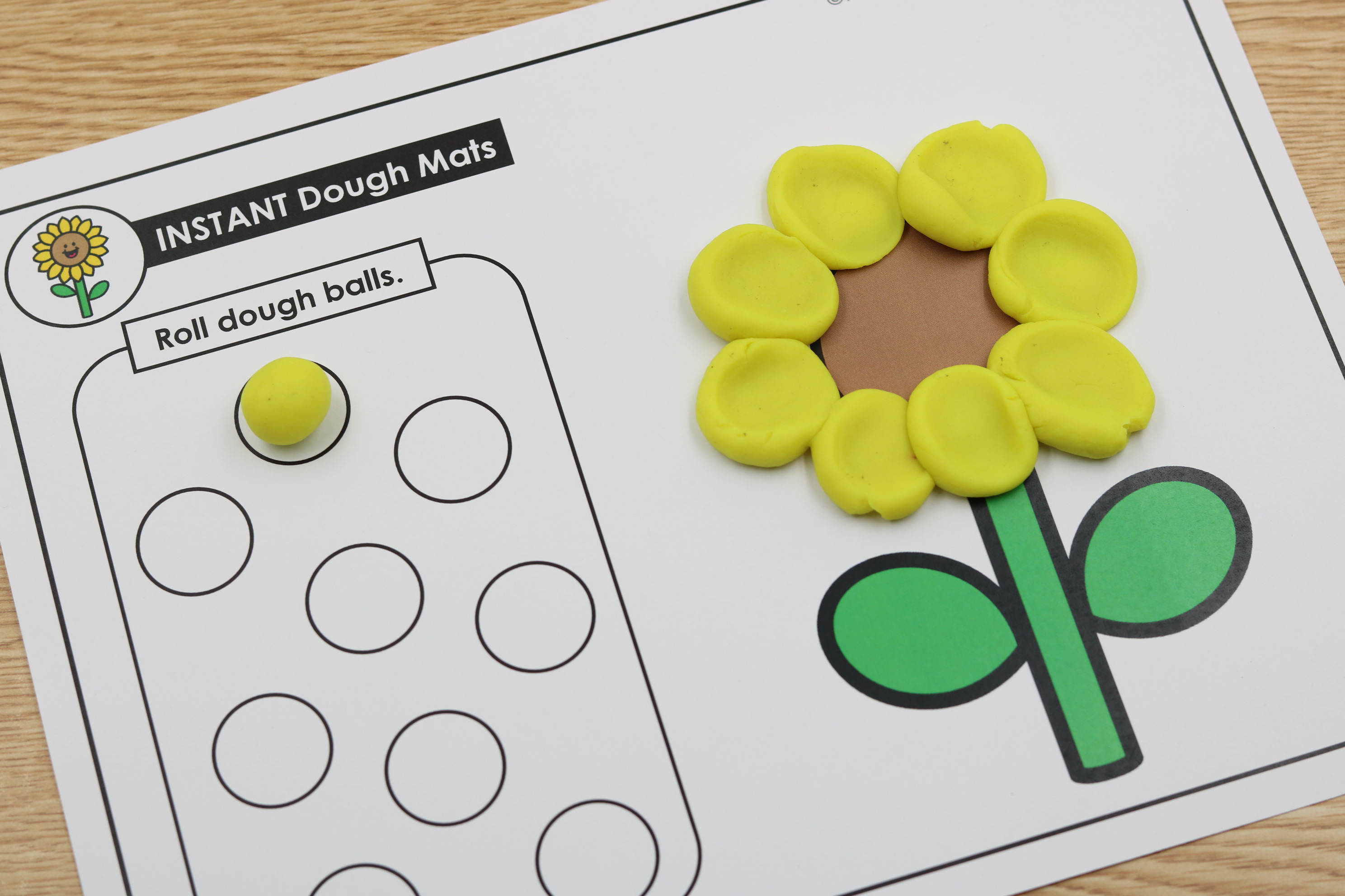 Free dough exploration mat showing a flower students roll the dough balls