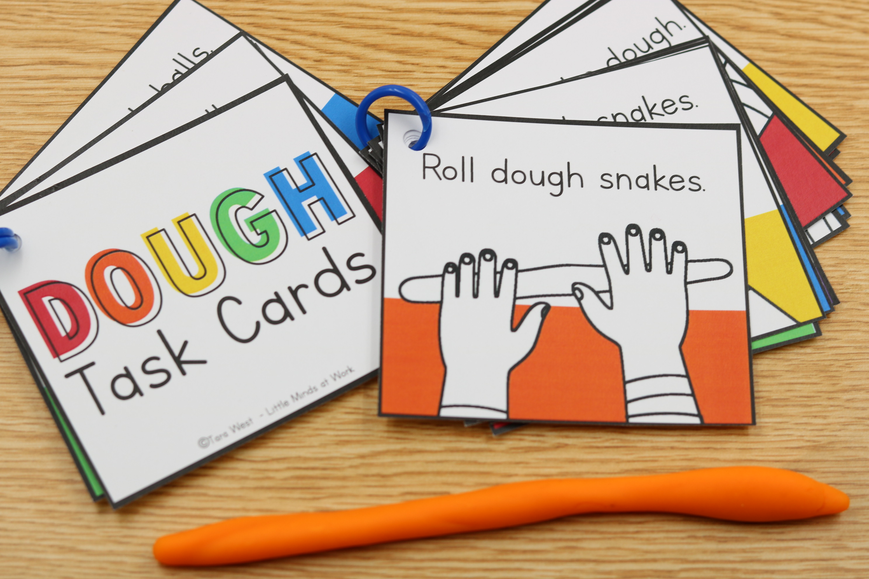 Free dough task cards student rolling a dough snake for fine motor practice