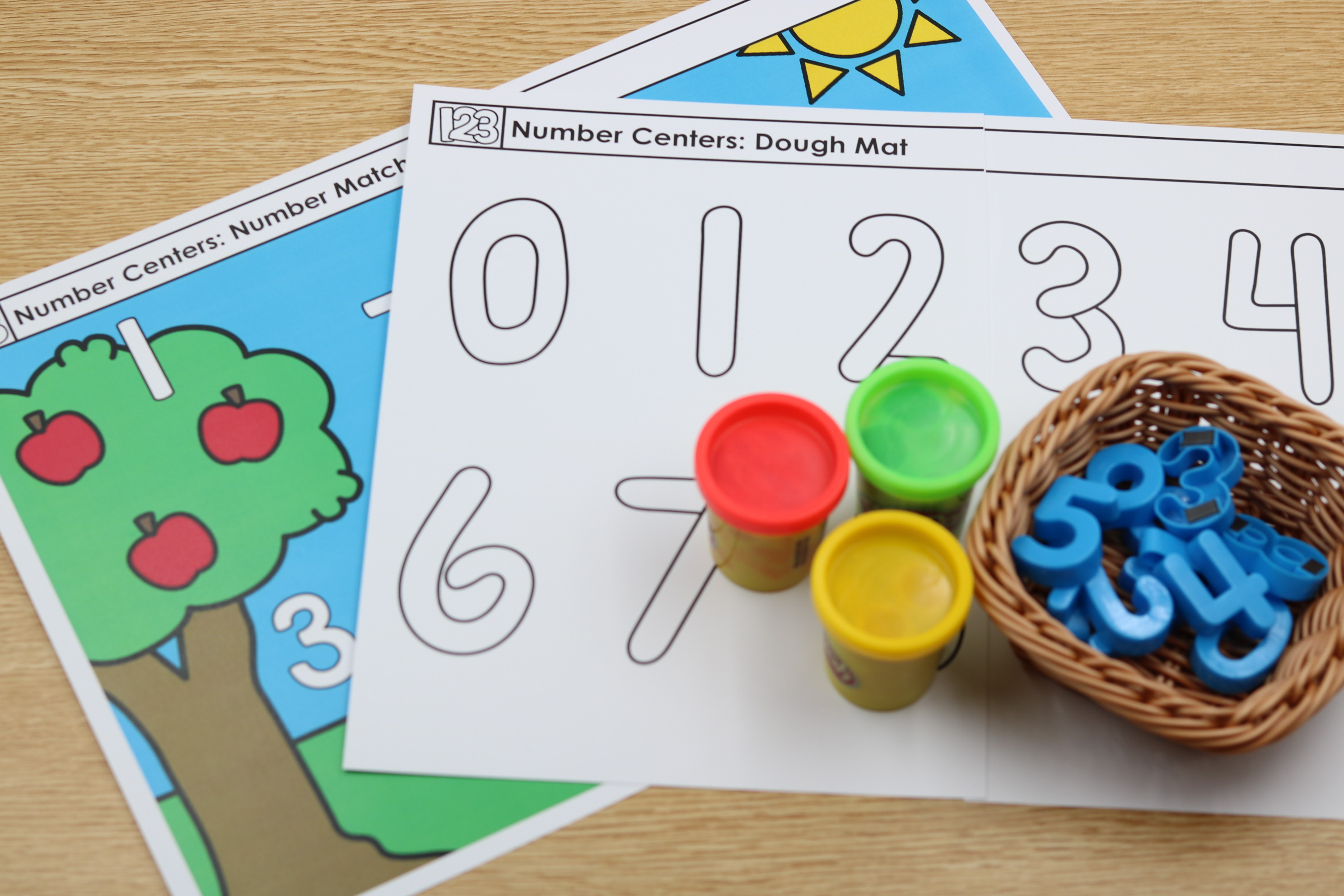 Numbers free dough and magnet mats as students practice numbers 1 through 10.