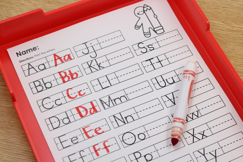 Free December handwriting worksheets for alphabet and number practice