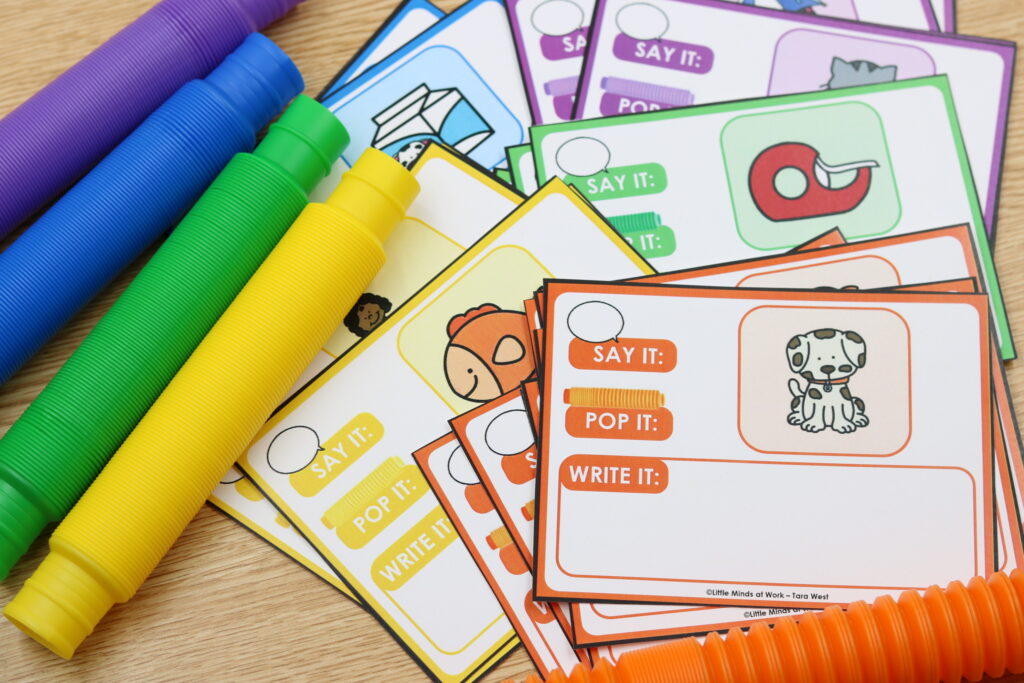 Free CVC stretch pop tube cards for segmenting and blending phonics practi