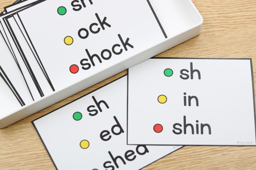 Free digraph builder cards with color-coded sound dots for phonics decoding.