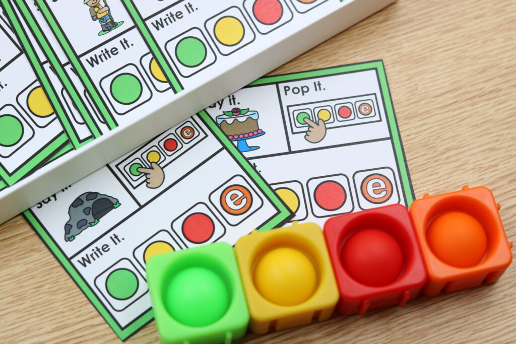 Free CVCe Pop It cards for silent e words with color-coded sound popping practice.