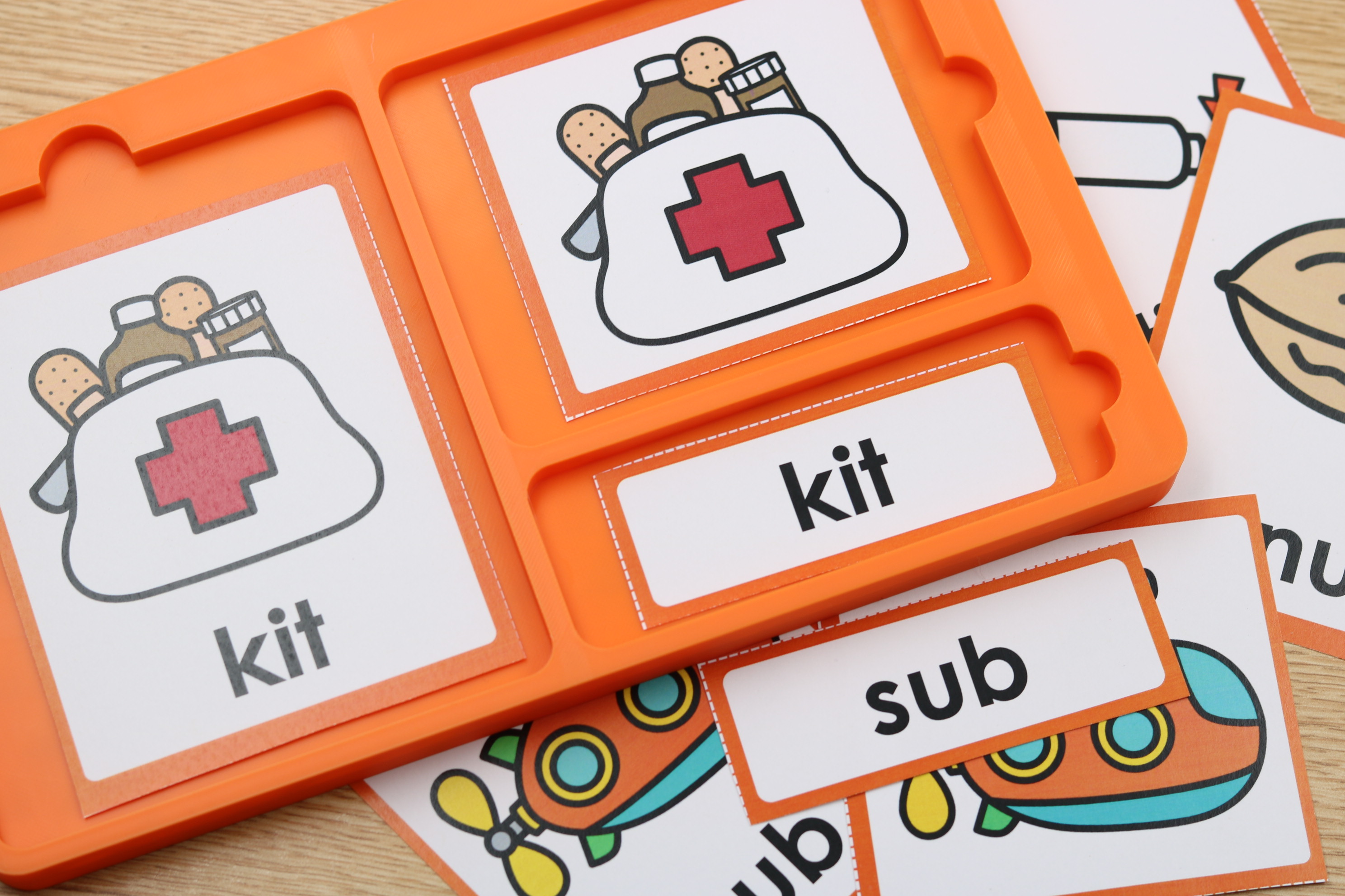 Hands-on phonics literacy center for matching pictures and decodable words