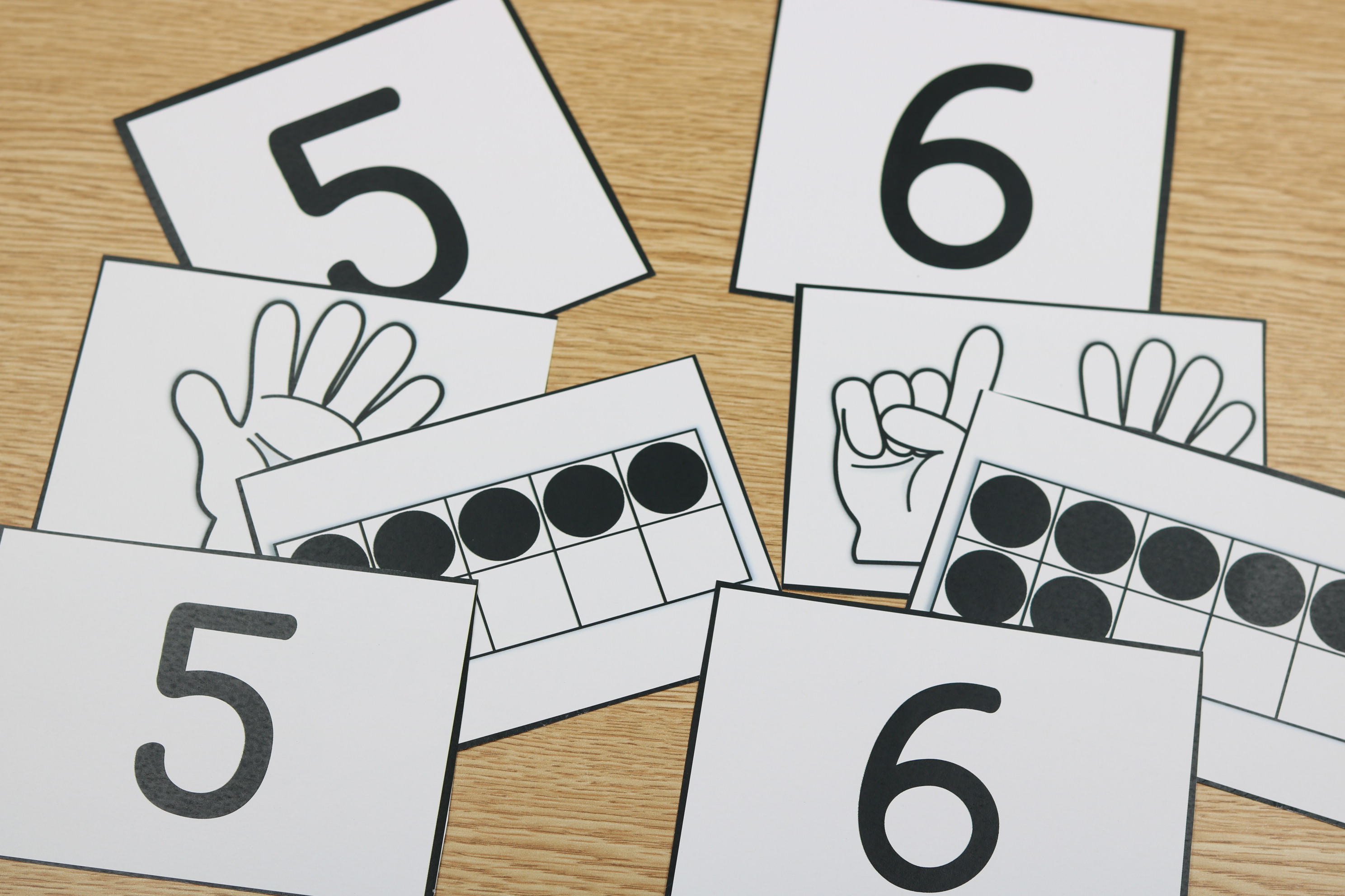 Students developing number sense with visual math tools including ten frames, number paths, counting activities, and number relationship practice.