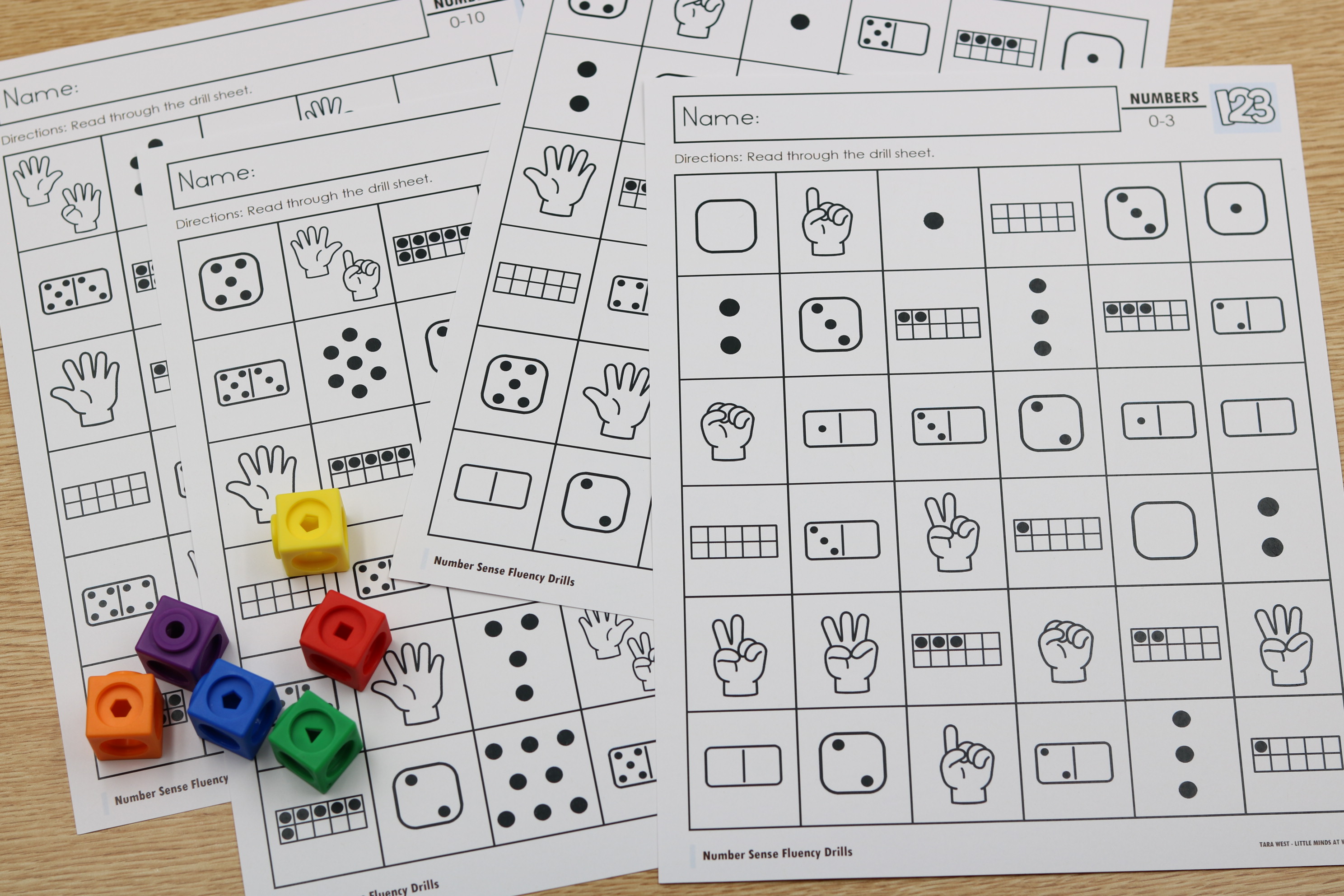 Students using number sense drill mats as they count the fingers, dots, and ten frames.