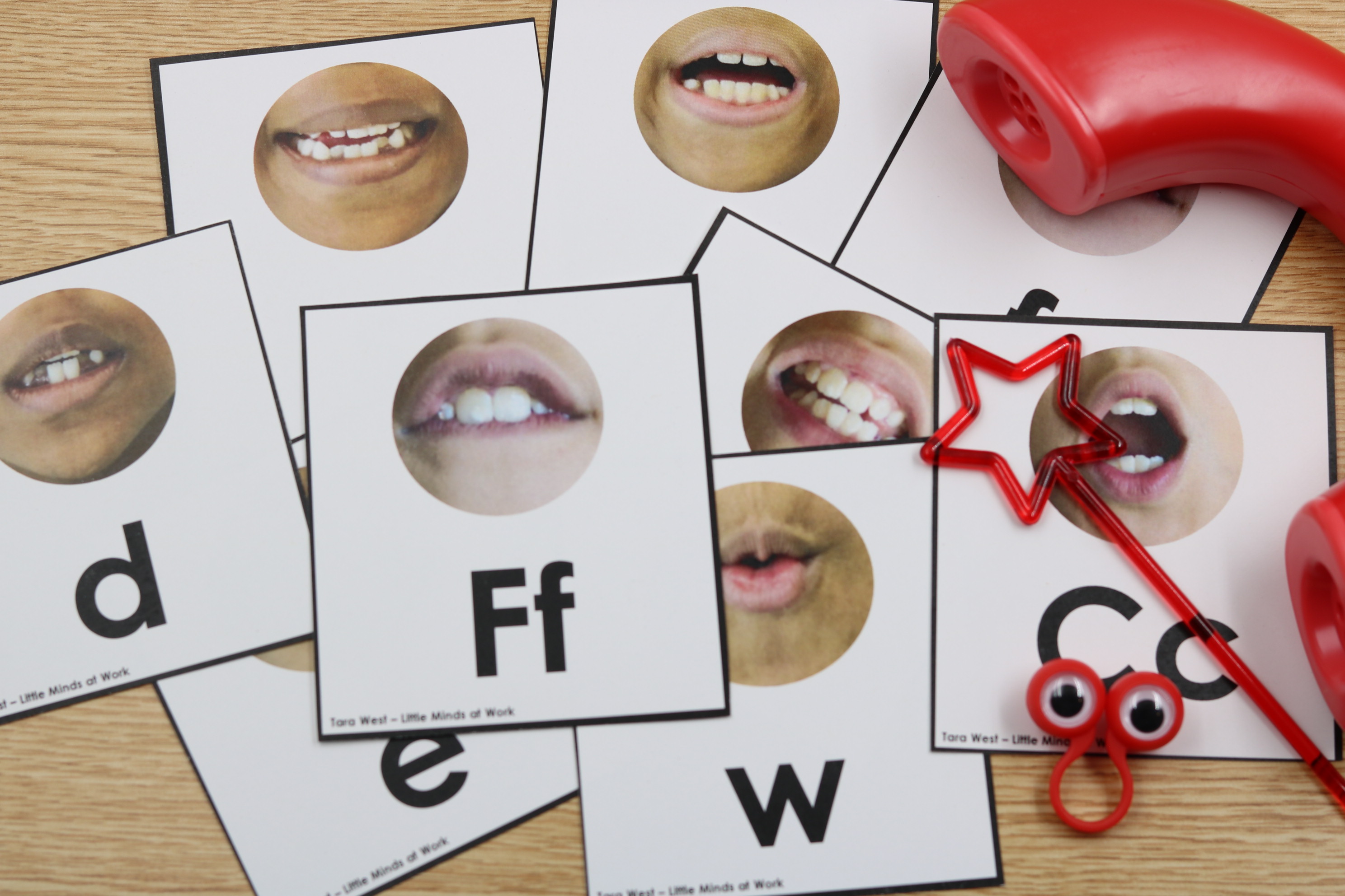 Free phonics mouth formation cards displayed in a pocket chart