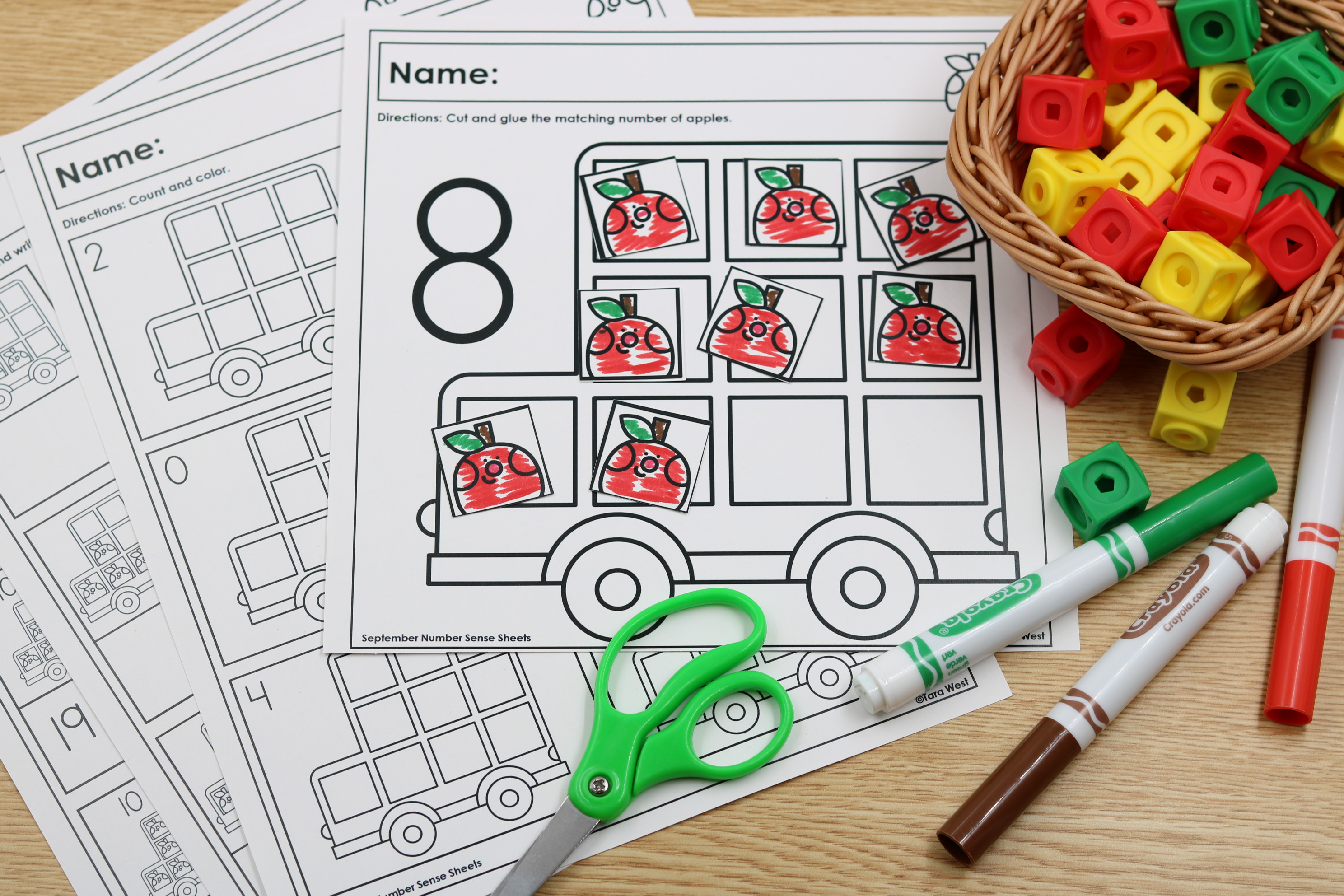 Apple-themed number sense cut-and-paste printable with apple images and numbers
