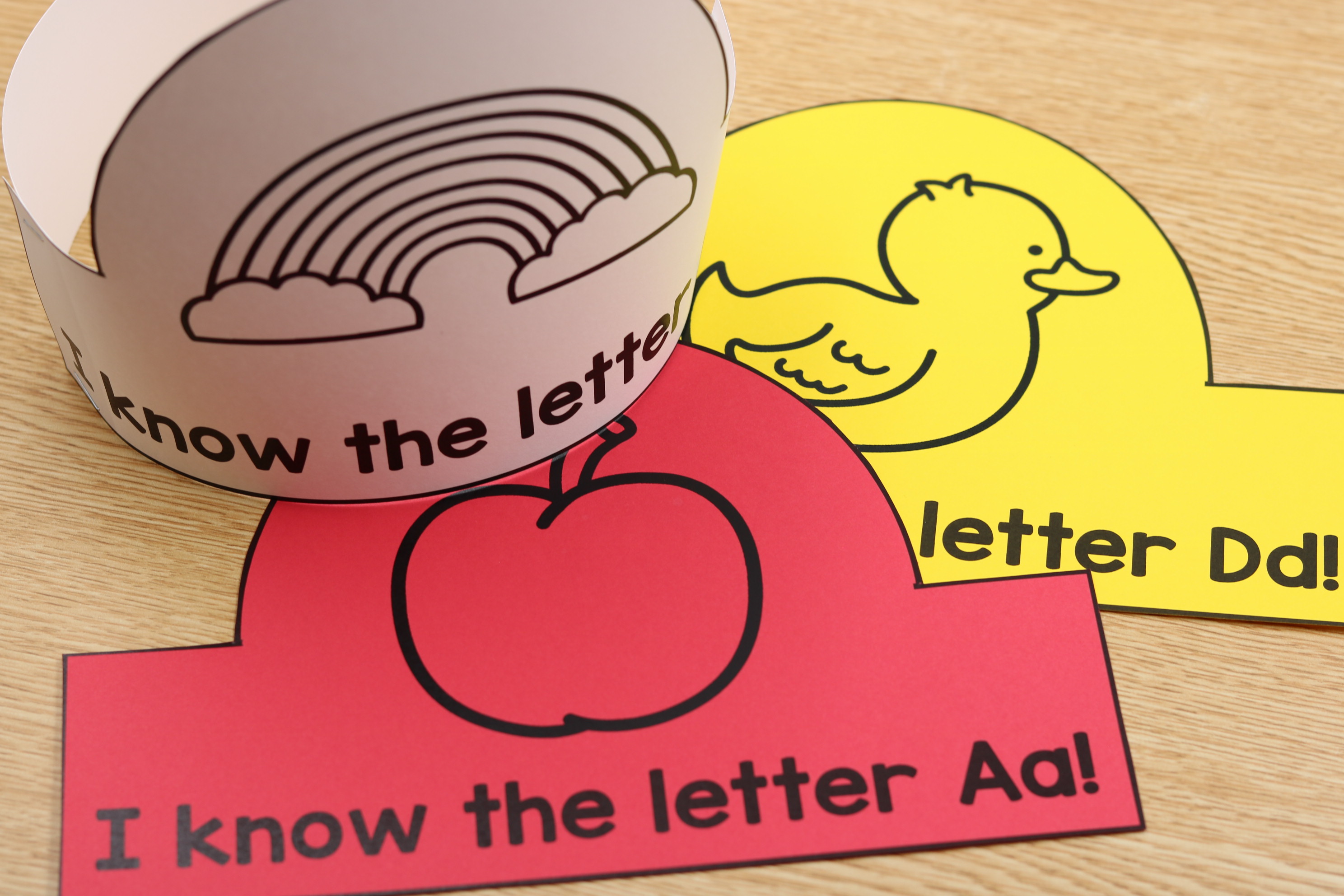 Printable alphabet crown featuring the letter A and apple image for classroom letter celebration.