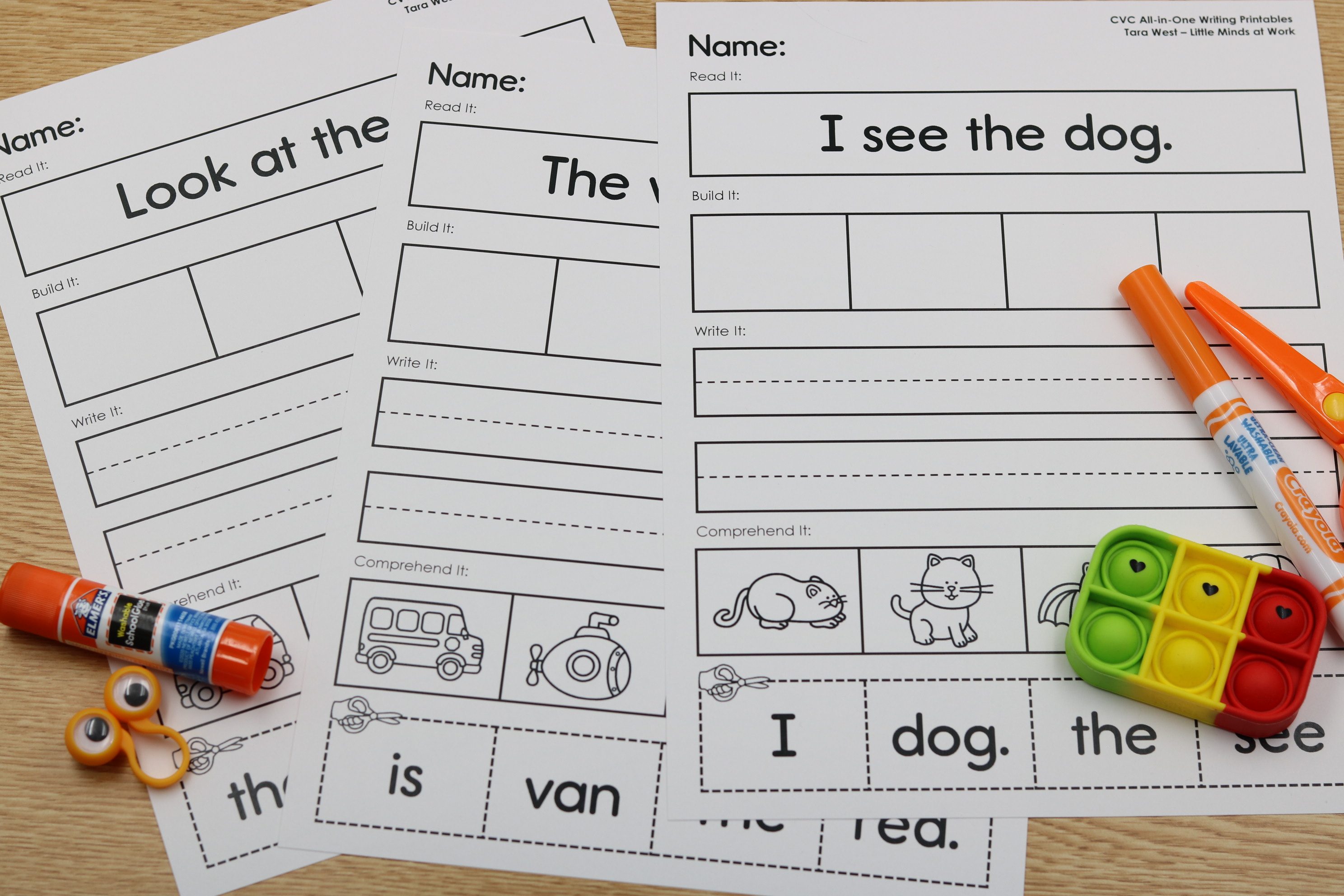 Free CVC label assisted writing worksheets for phonics and sentence practice