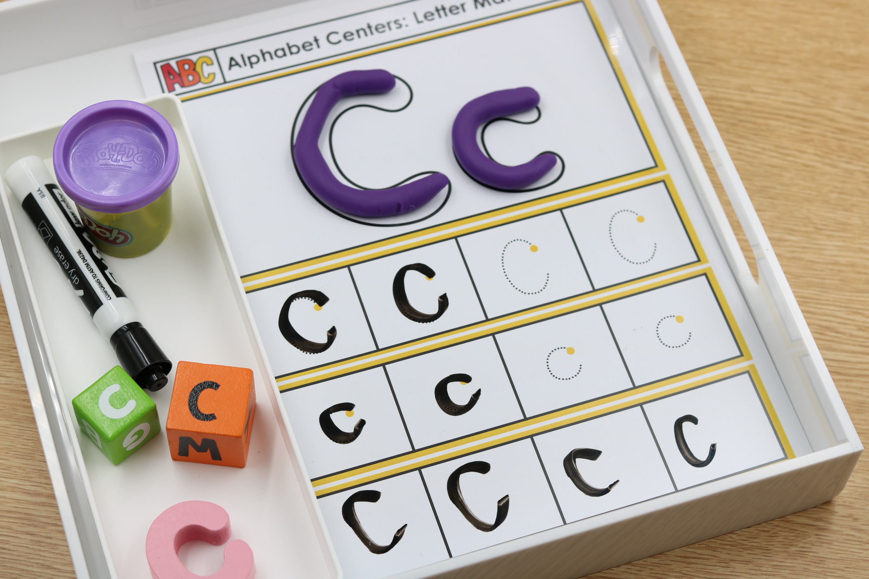 Alphabet sorting, tracing, and dough-building mats for phonics centers and fine motor practice.