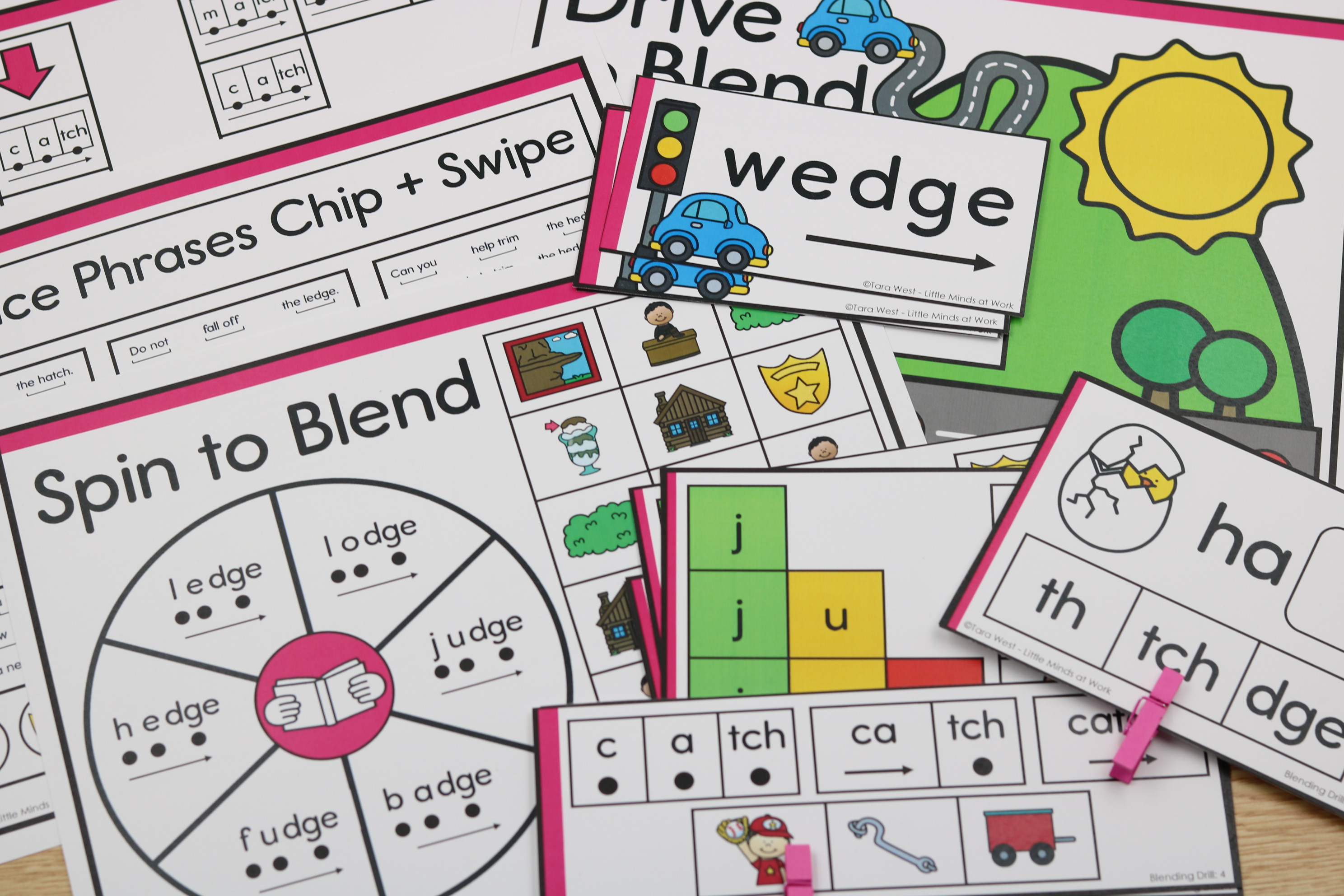 Hands-on phonics blending centers with clip cards and mat